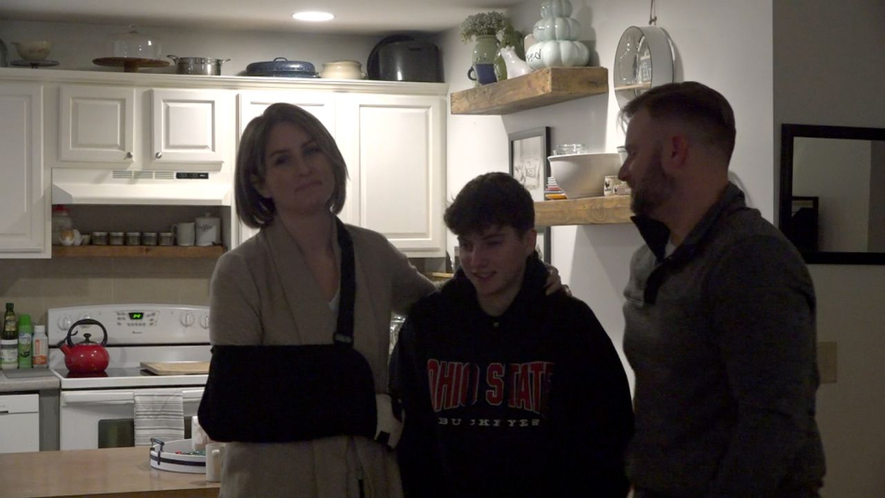 Kristen, Cyrus, and Michael Iarrobino in their home in Glenburn, Maine.