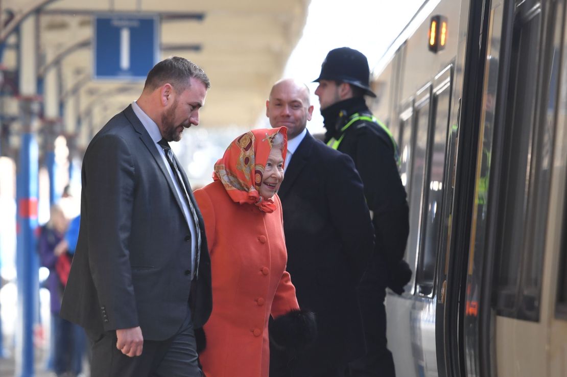 The Queen boards a train at King's Lynn railway station in Norfolk, as she returns to London after spending the Christmas period at Sandringham House.