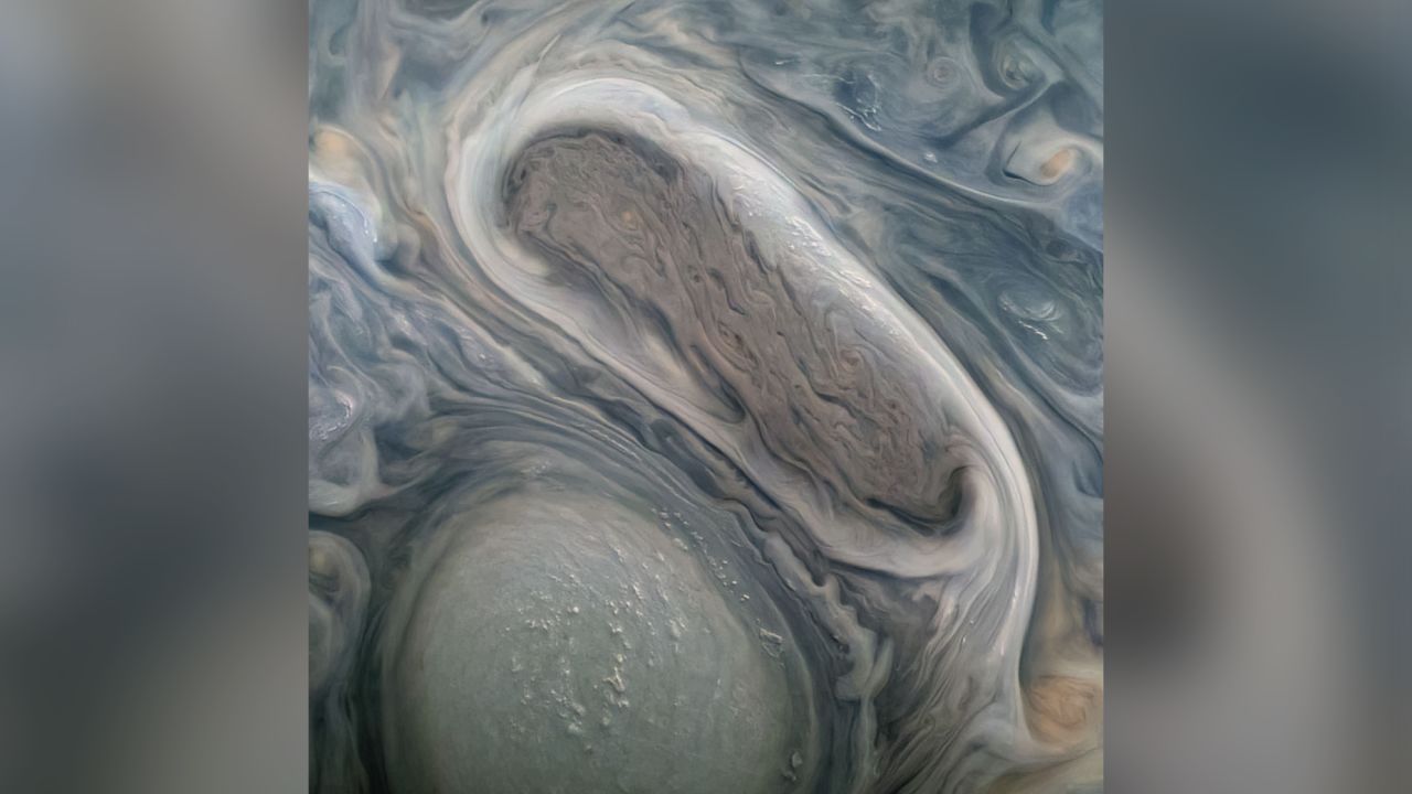 This image taken by the Juno mission shows two of Jupiter's large rotating storms, captured November 29.