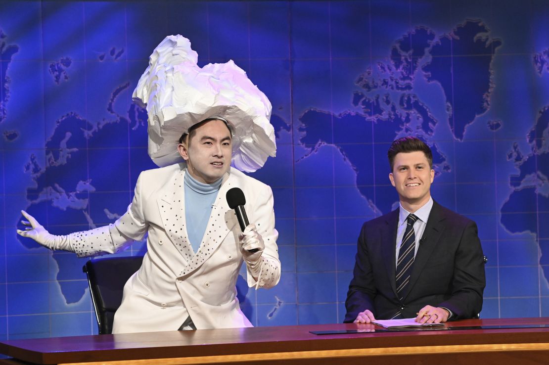 Bowen Yang as the Iceberg that sank the Titanic, left, and anchor Colin Jost during Weekend Update on "Saturday Night Live" in New York on April 10, 2021.