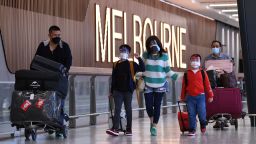 Passengers who traveled on Flight SQ237 from Singapore are seen exiting the international arrivals terminal at Tullamarine Airport in Melbourne, Australia, 01 November 2021.