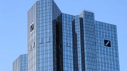 The logo of German giant Deutsche Bank is seen on their headquarters in Frankfurt am Main, western Germany, on February 4, 2021.