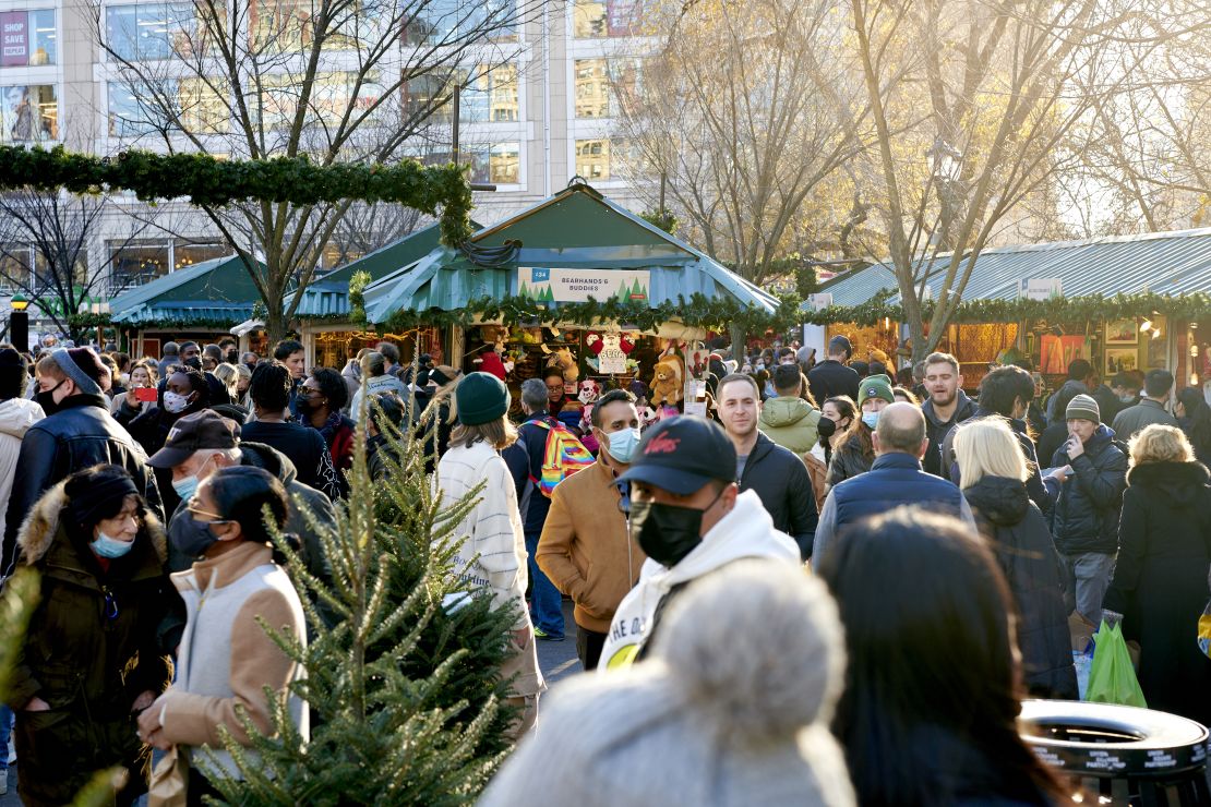 Shoppers walk through the Urbanspace Union Square Holiday Market in New York City, on Dec. 12, 2021. 