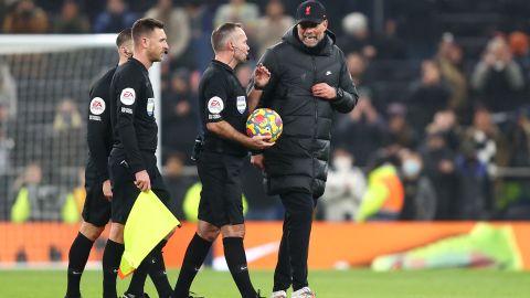 Klopp berates referee Paul Tierney as he tries to walk off the pitch at full-time. 