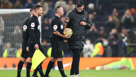 Klopp berates referee Paul Tierney as he tries to walk off the pitch at full-time.