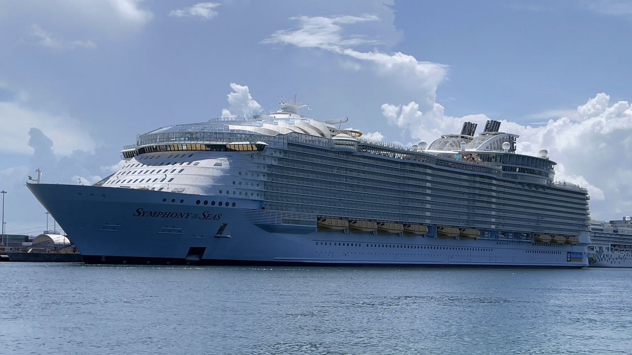 The Royal Caribbean cruise ship, Symphony of the Seas, is seen moored in the Port of Miami on August 1, 2021. 