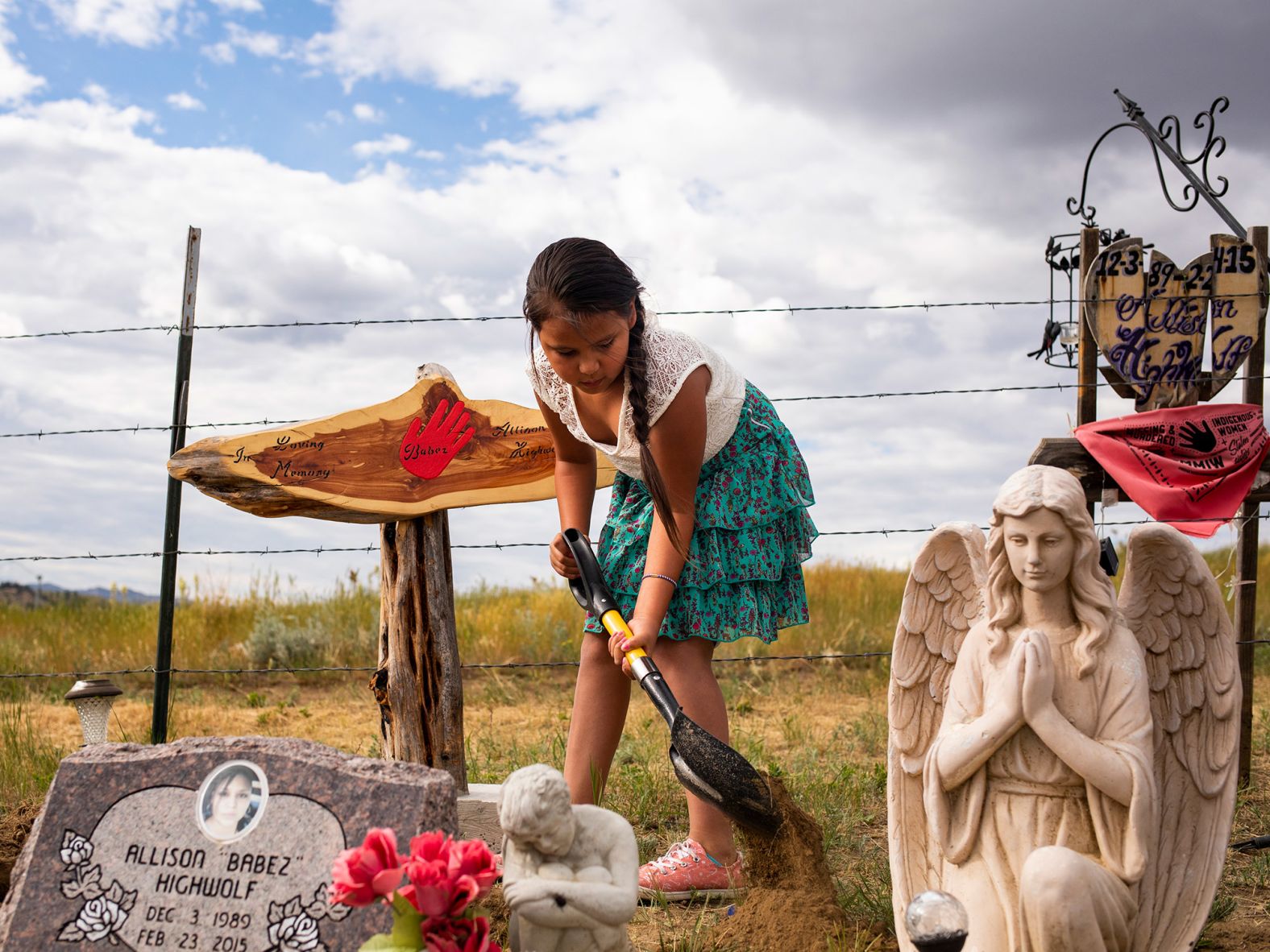 <strong>Tailyr Irvine, based in Missoula, Montana, USA: </strong>Aiyanna, one of four daughters, tends to her mother Allison Highwolf's grave in Busby, Montana, a town on the Northern Cheyenne Reservation. As Elizabeth Williamson <a href="https://www.nytimes.com/2021/07/11/us/politics/allison-highwolf-indian-country.html" target="_blank" target="_blank">reported for The New York Times:</a> Allison Highwolf's body was 'found alone in a motel room in February 2015. She died at 26 years old of smoke inhalation from a fire of unclear origin ... Six years later, the circumstances of Highwolf's death remains a mystery, one of many involving Native women who disappear or meet violent ends with alarming regularity.'<br /> <br />I met with the family and spent the day hearing about Allison and the case. That afternoon they planned to visit her grave to place a grave marker. I asked if I could attend and they graciously let me observe and photograph. I tried my best to keep a distance during their time at the grave to respect their privacy.<br /> <br />It's hard to visualize grief and loss but every time I look at this photo I am hit with the loss I feel for Aiyanna and her family. We hear a lot about the <a href="https://www.nativehope.org/en-us/understanding-the-issue-of-missing-and-murdered-indigenous-women" target="_blank" target="_blank">Missing and Murdered Indigenous Women</a> crisis but we rarely see the aftermath, the path of destruction unsolved cases leave.