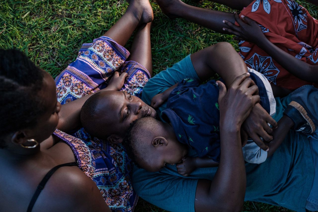 <strong>Sumy Sadurni, based in Kampala, Uganda:</strong> This is Blessing with her husband Jeremy on her lap, holding their son in the backyard of their family home in Entebbe, Uganda.<br /> <br />What stands out for me is the tenderness and the intimacy, but also the light was beautiful! Such a perfect moment, with perfect light.<br /> <br />I was able to capture a tender and comfortable moment. But the image also challenges the idea of family roles, particularly here at home where we're more used to seeing mums looking after children. This picture shows a different dynamic.