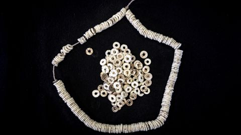A string of modern ostrich eggshell beads from eastern Africa is shown. 