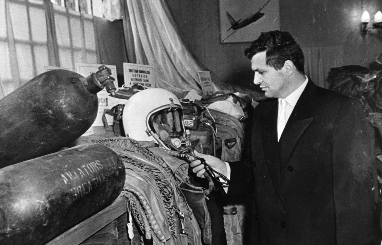 U-2 spy plane pilot Francis Gary Powers poses with his flight helmet among other evidence related to his Moscow trial in 1960. After the Soviets announced the capture of Powers, the United States recanted earlier assertions that the plane was on a weather research mission.