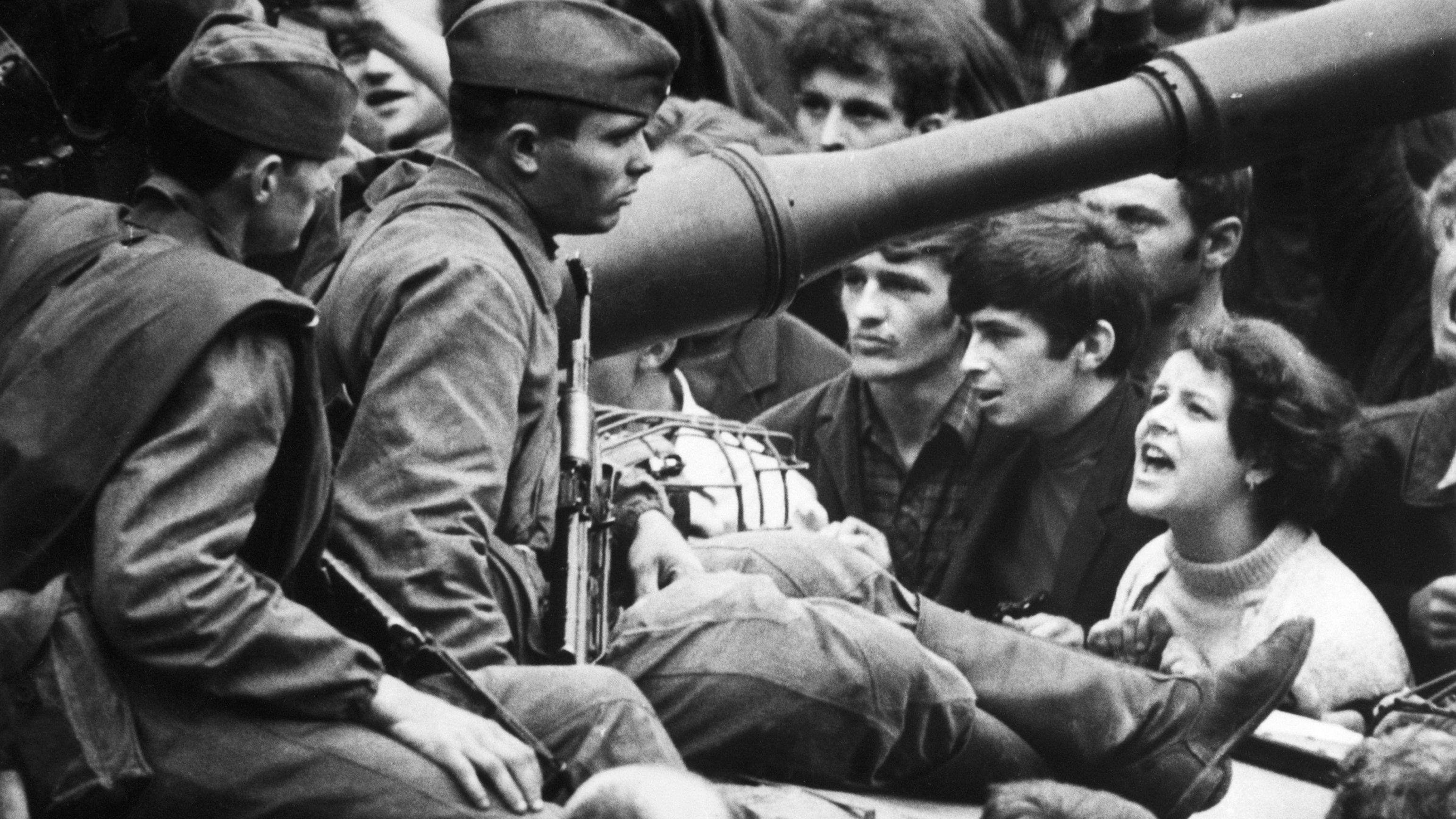 A young Czech woman shouts "Ivan go home!" to soldiers sitting on tanks in the streets of Prague in 1968. On January 5, 1968, reformer Alexander Dubcek became general secretary of the Communist Party in Czechoslovakia, pledging the "widest possible democratizations" as the Prague Spring movement swept across the country. Soviet and Warsaw Pact leaders sent an invasion force of 650,000 troops in August. Dubcek was arrested and hard-liners were restored to power.
