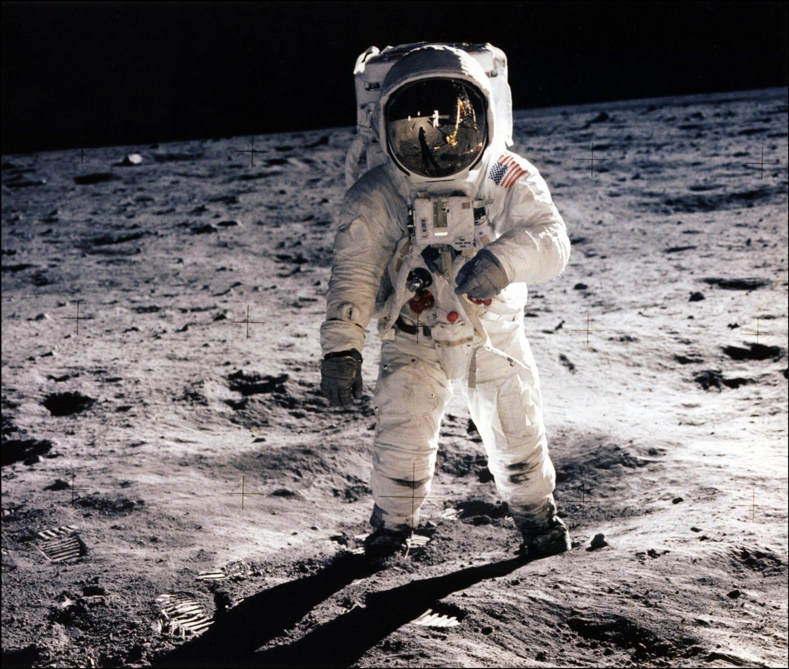 Apollo 11 astronaut Edwin E. "Buzz" Aldrin Jr. walks on the lunar surface on July 20, 1969. He and mission commander Neil Armstrong became the first humans to walk on the moon. Their mission was considered an American victory in the Cold War and subsequent space race, meeting President Kennedy's goal, voiced in 1961, of "landing a man on the moon and returning him safely to the earth" before the end of the decade.