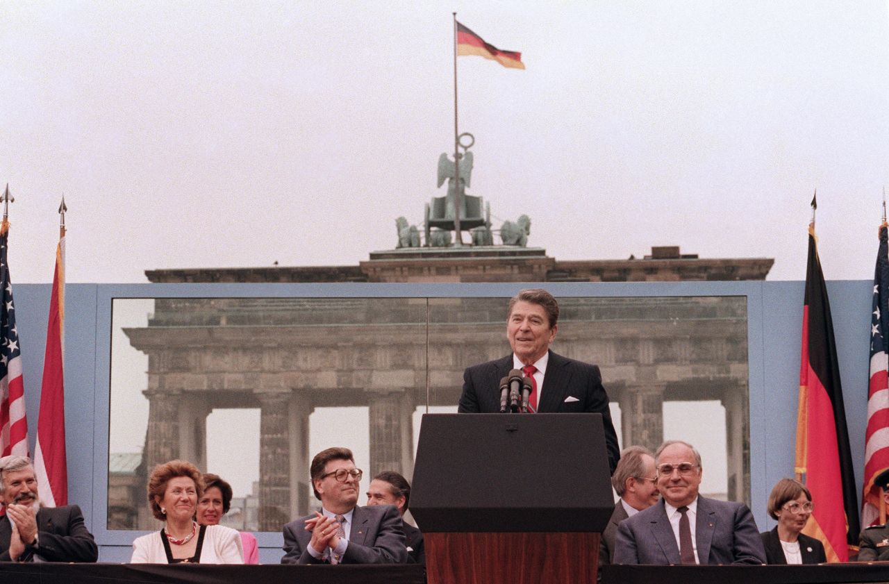 US President Reagan, commemorating the 750th anniversary of Berlin, addresses the people of West Berlin at the base of the Brandenburg Gate, near the Berlin Wall on June 12, 1987. Due to the amplification system being used, the President's words could also be heard on the Eastern (communist-controlled) side of the wall. "Tear down this wall!" was the famous appeal by Reagan, directed at Gorbachev, to destroy the Berlin Wall. The address Reagan delivered that day is considered by many to have affirmed the beginning of the end of the Cold War and the fall of the Soviet bloc. 