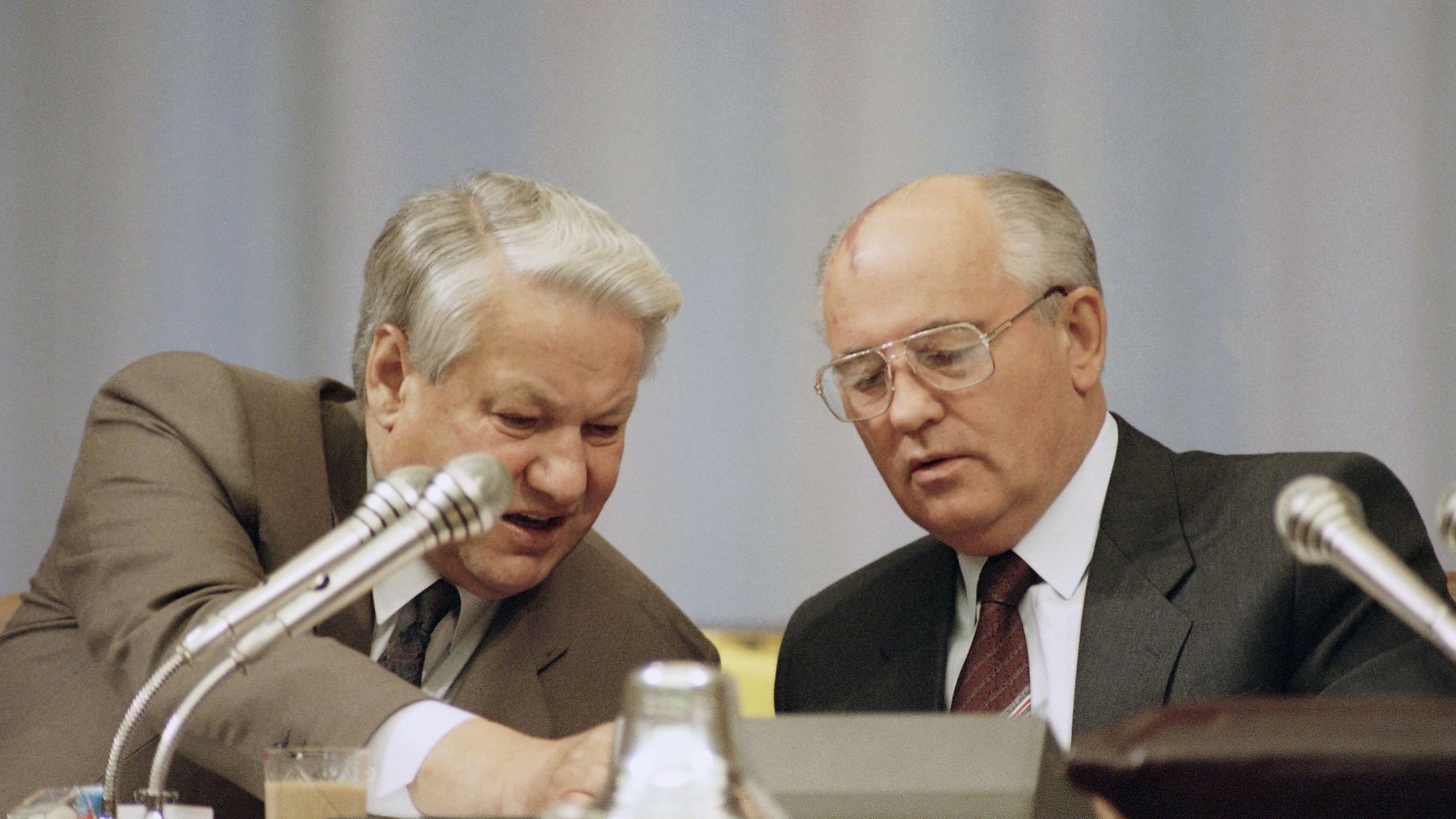 Russian Federation President Boris Yeltsin, left, and Soviet President Gorbachev look over a document while attending the Congress of People's Deputies in Moscow in September 1991. While vacationing in the Crimean peninsula, Gorbachev was ousted in a coup by Communist hard-liners on August 19, 1991. The coup soon faltered as citizens took to the streets of Moscow and other cities in support of Yeltsin, who denounced the coup. Yeltsin was the first democratically elected president of Russia.