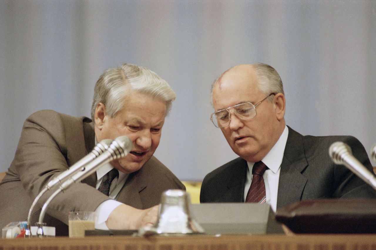 Russian Federation President Boris Yeltsin, left, and Soviet President Gorbachev look over a document while attending the Congress of People's Deputies in Moscow in September 1991. While vacationing in the Crimean peninsula, Gorbachev was ousted in a coup by Communist hard-liners on August 19, 1991. The coup soon faltered as citizens took to the streets of Moscow and other cities in support of Yeltsin, who denounced the coup. Yeltsin was the first democratically elected president of Russia.