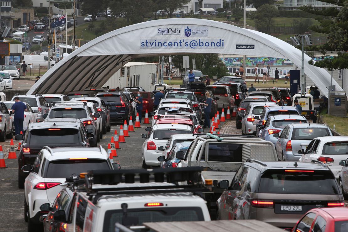 People queuing at the St. Vincent's Bondi Beach Covid-19 drive-through testing clinic on December 17, 2021.