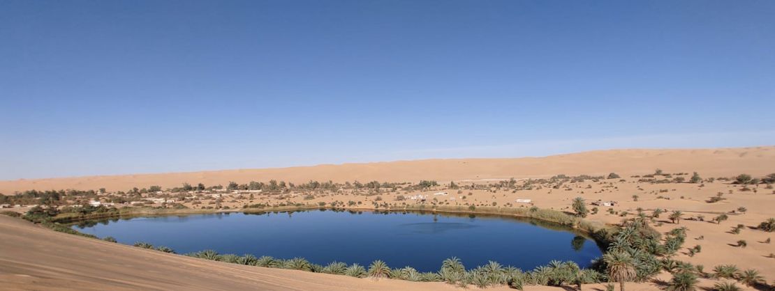Fernando Espinoza described Gaberoun oasis as "amazing" in text messages to his mother and sent this photo of the lake.