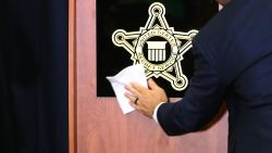 A sign with the U.S. Secret Service shield is cleaned before a briefing at the service's headquarters November 07, 2019 in Washington, DC.