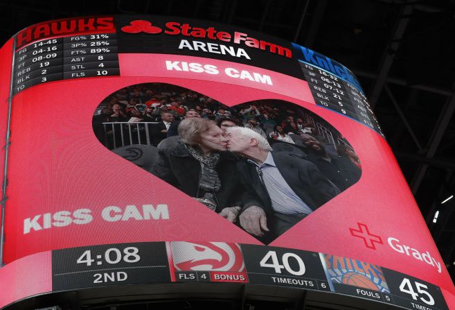The Carters are seen on the "kiss cam" during an NBA basketball game in Atlanta in 2019.