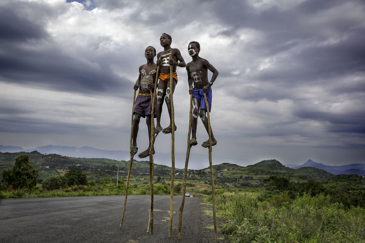Children playing with makeshift stilts in Ethiopia. Scroll through the gallery to see more images from Nancy Richards Farese's book "Potential Space."