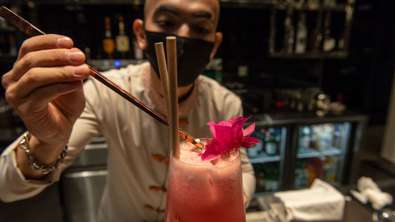 <strong>Sundowners:</strong> A bartender puts the finishing touches to an Orange Sunset mocktail.