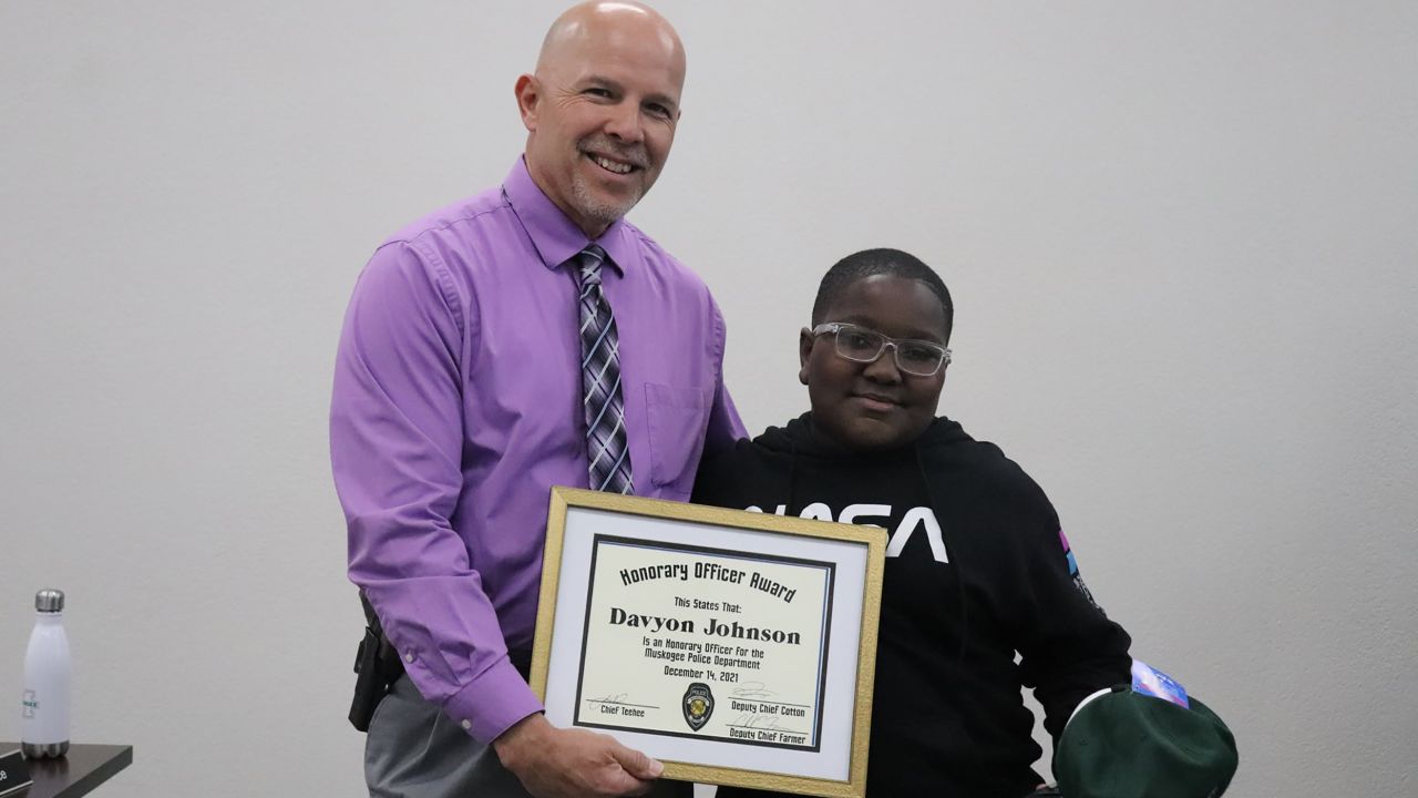 The Muskogee Police Department presented Davyon Johnson with an honorary officer certificate.