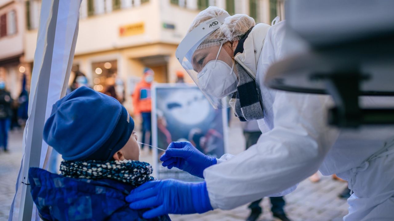 TUBINGEN, GERMANY - NOVEMBER 28: Local doctor Lisa Federle takes a nasal swab sample from a drop-in patient seeking a Covid test in Federle's mobile testing station during the second wave of the coronavirus pandemic on November 28, 2020 in Tubingen, Germany. Federle bought 20,000 antigen rapid test kits for EUR 100,000 and is offering the tests free of charge, though she is grateful for donations. "No one should be alone at Christmas," she reportedly said. She has received support from a local musician as well as the German Red Cross. Germany is in the midst of a surge in coronavirus infections whole daily averages have been levelling out over recent weeks but remain high. (Photo by Thomas Niedermueller/Getty Images)