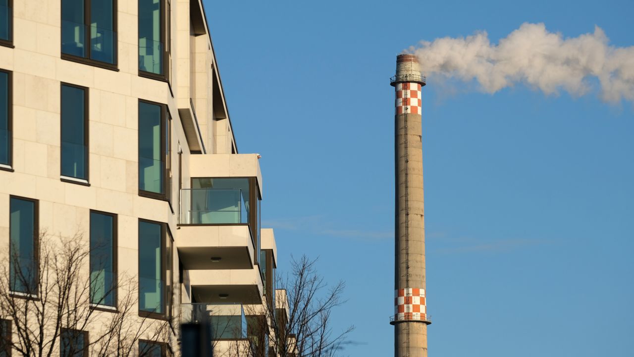 Exhaust emerges from the smokestack of a natural gas-fired power plant in Berlin, Germany.