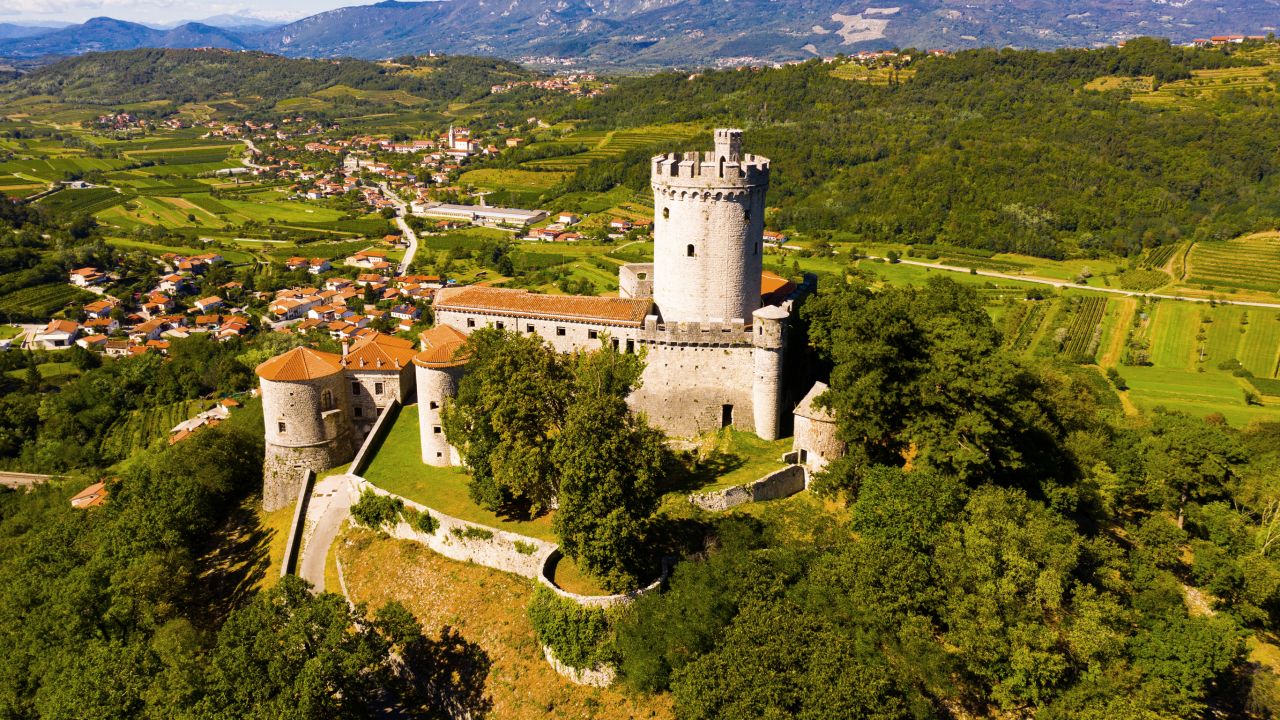<strong>Rihemberk Castle:</strong> This imposing medieval building sits on a hilltop in Slovenian township of Branik. Dating from the 13th century, and added to over the centuries, this sprawling castle has the tallest tower in Slovenia. 