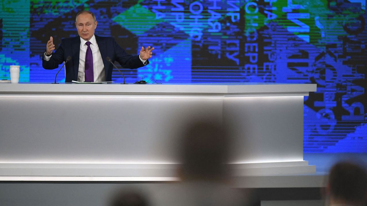 Russian President Vladimir Putin holds his annual press conference at the Manezh exhibition hall in central Moscow on December 23, 2021. 