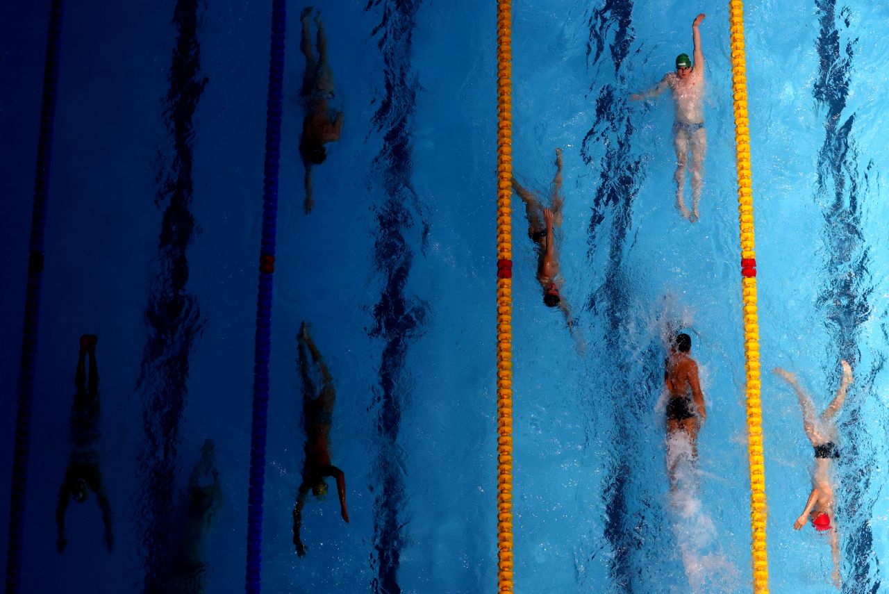Swimmers warm up on day four of the FINA World Swimming Championships in Abu Dhabi on December 19.