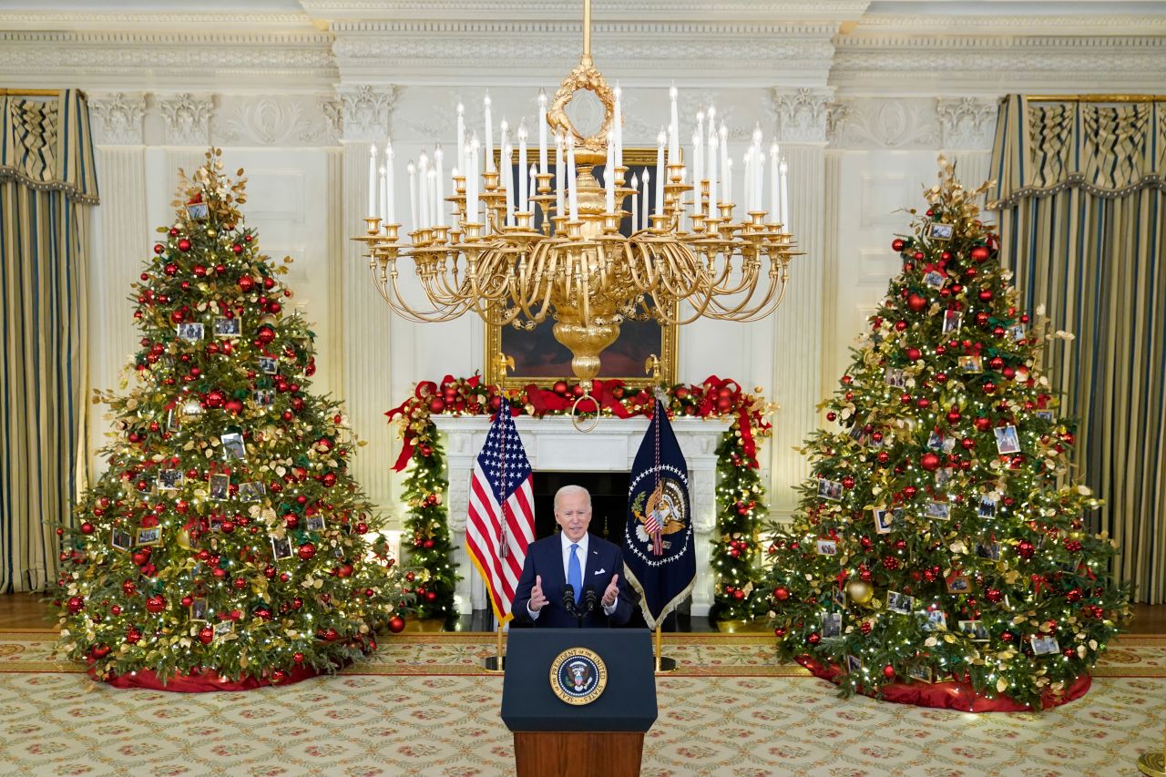 US President Joe Biden speaks about the Covid-19 surge from the State Dining Room of the White House on December 21. The President aimed to <a href="https://www.cnn.com/2021/12/21/politics/biden-covid-omicron-free-at-home-tests/index.html" target="_blank">reassure vaccinated Americans</a> that they can still proceed with their holiday plans without fear of becoming seriously ill, announcing a number of new efforts to combat the rising cases. 