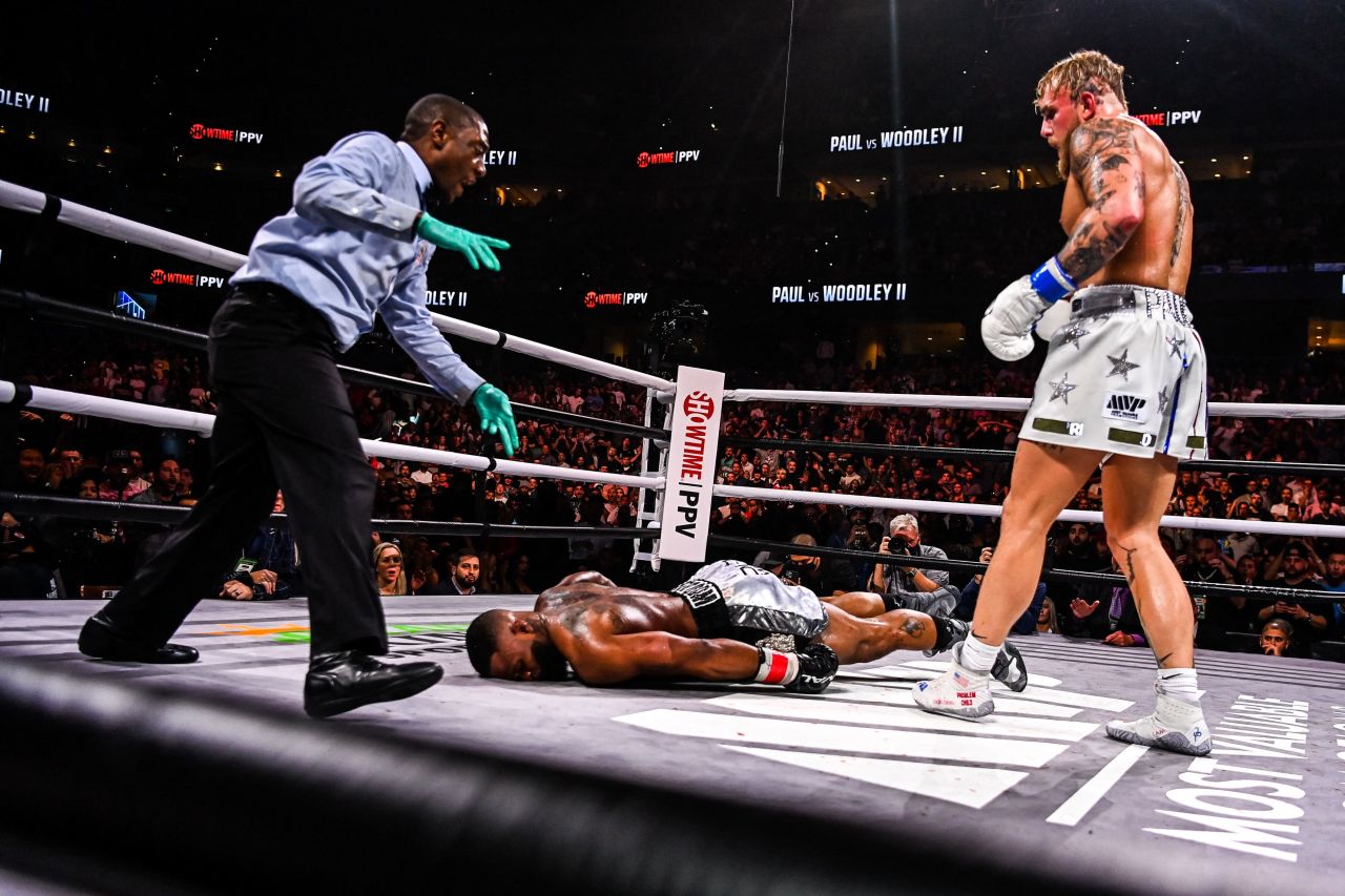 YouTube personality Jake Paul knocks out former UFC welterweight champion Tyron Woodley during round six of <a href="https://www.cnn.com/2021/12/18/sport/jake-paul-tyron-woodley-2-fight/index.html" target="_blank">an eight-round bout</a> in Tampa on December 18.  