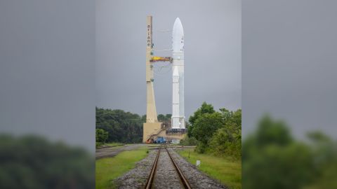 The Ariane 5 rocket and its cargo towers above the surroundings in French Guiana.