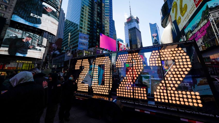 The 2022 sign that will be lit on top of a building on New Year's Eve is displayed in Times Square, New York, Monday, Dec. 20, 2021. Crowds will once again fill New York's Times Square this New Year's Eve, with proof of COVID-19 vaccination required for revelers who want to watch the ball drop in person, Mayor Bill de Blasio announced last week. (AP Photo/Seth Wenig)