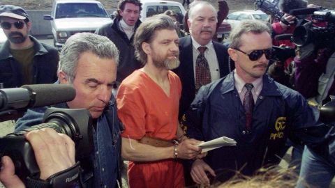 Ted Kaczynski is guided to his arraignment by federal marshals in Helena, Montana, April 4, 1996.