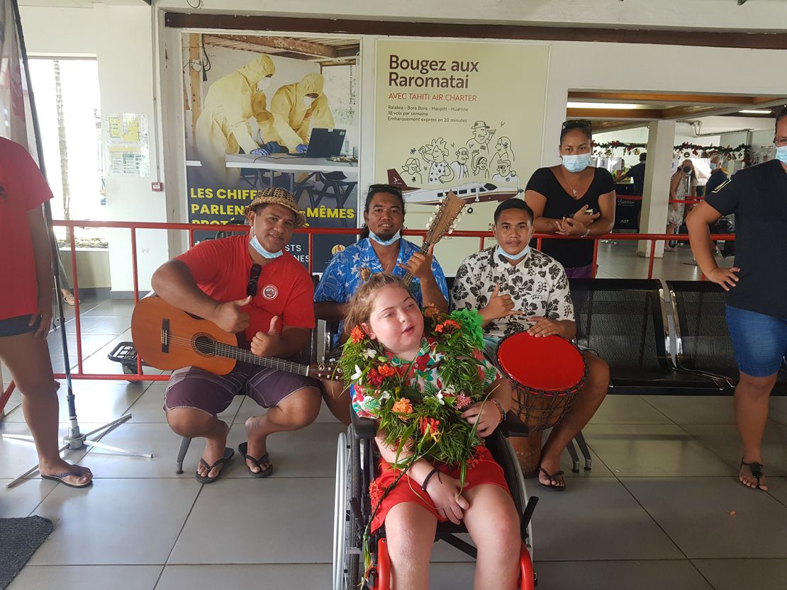 Mathias was greeted with flowers and music upon arriving on Raiatea. 