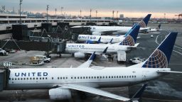 NEWARK, NEW JERSEY - NOVEMBER 30: United Airlines planes sit on the runway at Newark Liberty International Airport on November 30, 2021 in Newark, New Jersey. The United States, and a growing list of other countries, has restricted flights from southern African countries due to the detection of the COVID-19 Omicron variant last week in South Africa. Stocks in the travel and airline industry have fallen in recent days as fears grow over the spread and severity of the variant.  (Photo by Spencer Platt/Getty Images)