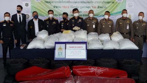 Thai authorities and police officers display seized crystal methamphetamine in Bangkok, Thailand, on December 23.