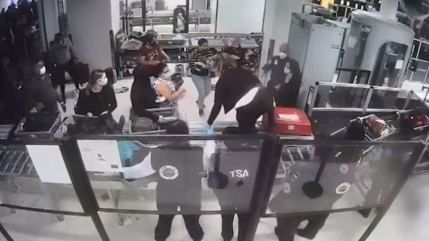 Couple go away child at Israeli airport check-in Couple go away child at Israeli airport check-in