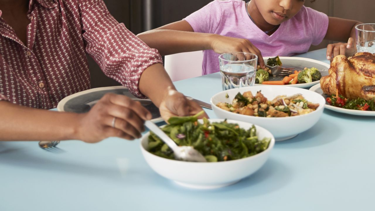 Studies show eating meals as a family can improve children's success in school and lower depression. 