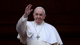 Pope Francis waves following his Christmas Urbi et Orbi blessing in St. Peter's Square on December 25, 2021. 
