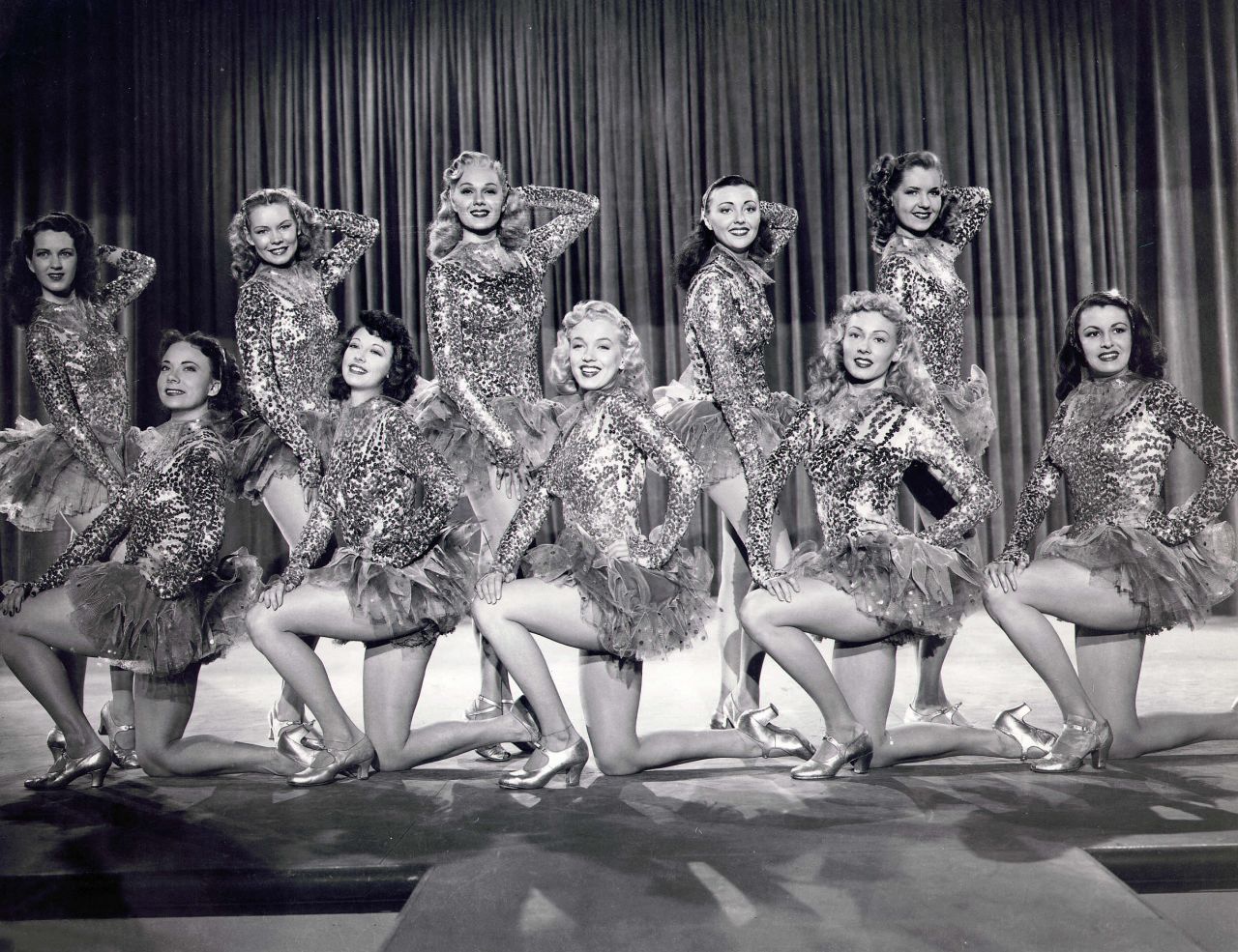Within a month of signing with Columbia Pictures, 21-year-old Monroe landed her first starring role as a burlesque dancer in a low-budget musical. In the "Ladies of the Chorus," she played a chorus girl named Peggy Martin, who was courted by a lovestruck fan.