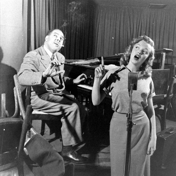 Monroe starred in several musicals. Picture here, she's taking singing lessons with jazz musician Phil Moore at the Mocambo, the famous West Hollywood nightclub, in 1948.