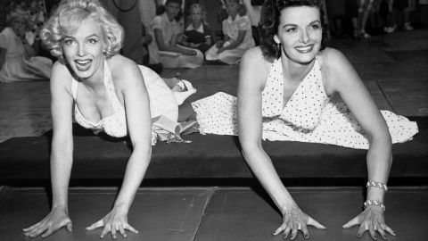 Monroe and "Gentlemen Prefer Blondes" co-star Jane Russell place their hands in cement at Grauman's Chinese Theatre. The musical comedy topped the box office in 1953.