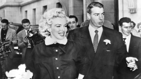 Monroe and former Yankees baseball player Joe DiMaggio leave city hall after their wedding. After two years of dating, their marriage captivated the nation in 1954. "He has a very sensitive nature in many respects. When he was young, he had a very difficult time. So he understood some things about me, and I understood some things about him," Monroe said. 