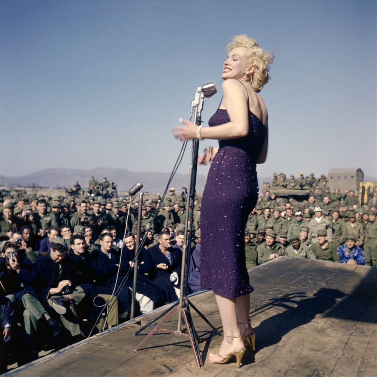 Thousands of US Marines stationed in Korea gathered to listen to Monroe sing. "The highlight of my life was singing for the soldiers there," she said. "I stood out on an open stage, and it was cold, but I swear I didn't feel a thing except good."
