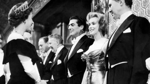 Queen Elizabeth II meets Monroe at the Royal Command Film Performance in London in 1956. Monroe went to England to film "The Prince and the Showgirl" with actor Laurence Olivier.