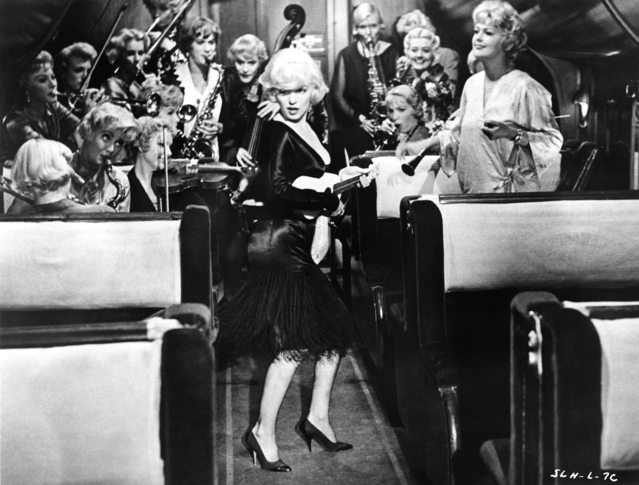 Playing Sugar Kane, Monroe sings and plays the ukulele in the movie "Some Like It Hot." The film is one of her greatest performances. "When I knew I had the final shots, there was a moment of 'never again,'" said film director Billy Wilder. "Well, all I can tell you is if Marilyn was around today, I would be on my knees, 'Please, let's do it again.'"