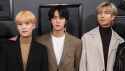 From left to right, Suga, Jin and RM of BTS attend the 62nd annual Grammy Awards on January 26, 2020.